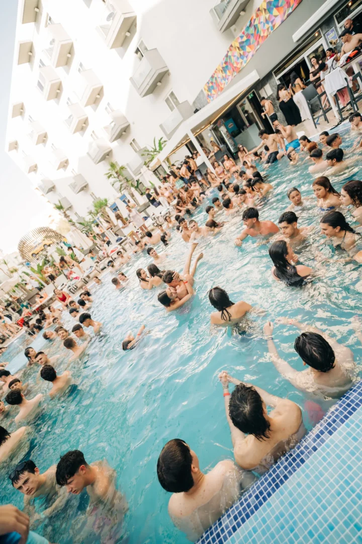 Pool packed with dancing lads and girls at Bora Bora Malta, bodies splashing, drinks raised and the party rolling all afternoon