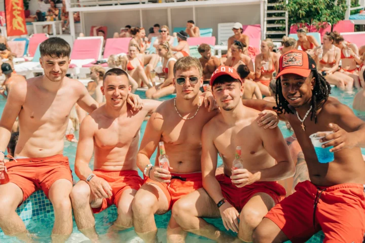 Baywatch Pool Party Kavos group of boys by the pool