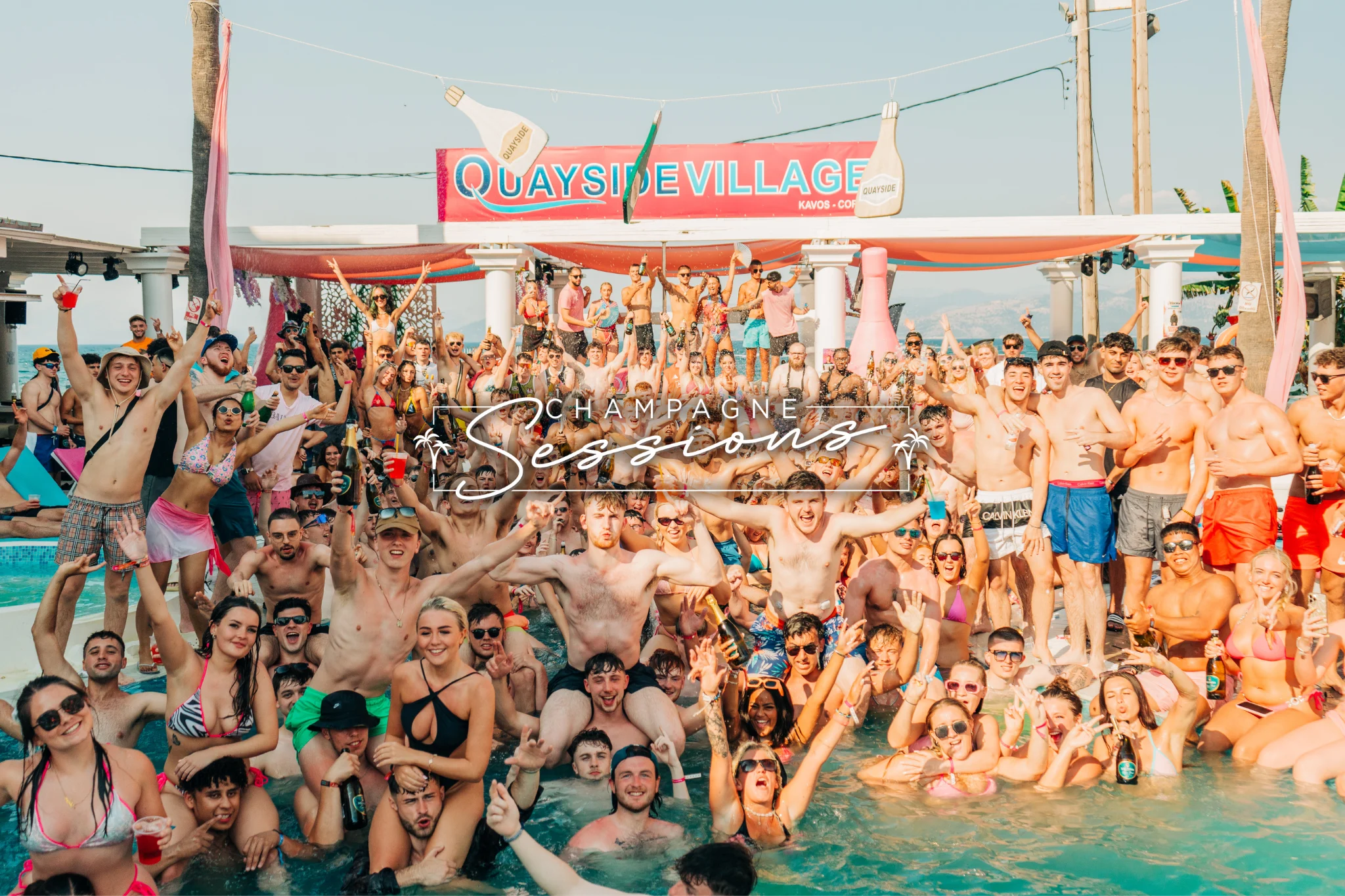The crowd goes wild at the Champagne Sessions Pool Party in Kavos, drinks in hand, vibes high and the party is in full swing