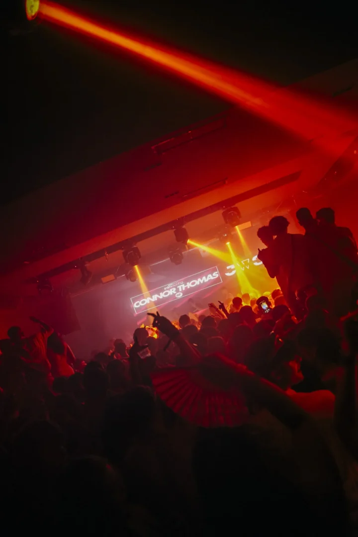 Agenda White Party in Kavos as Connor Thomas drops heavy beats, red lasers blazing over a packed crowd with hands up