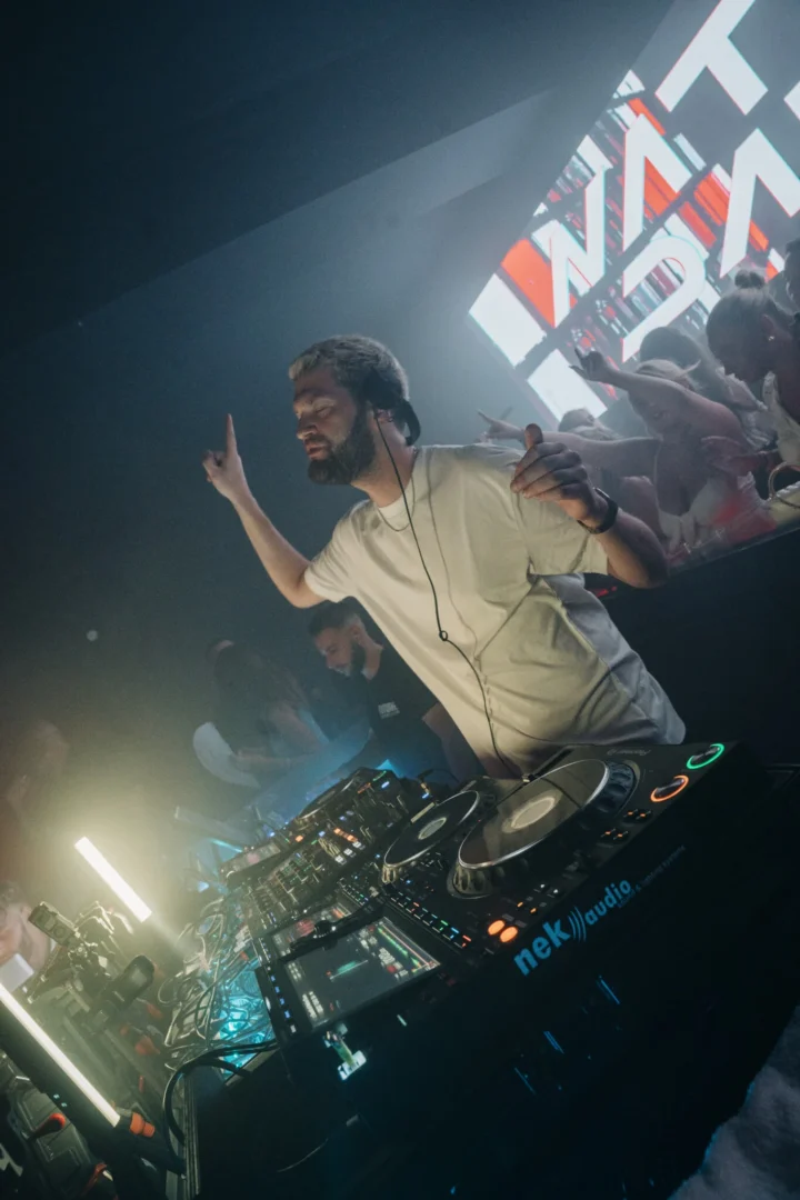 Nathan Dawe commands the decks at Agenda White Party in Kavos as strobes hit and the crowd roars back